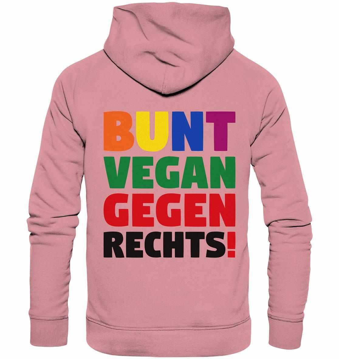 Vegan und Bio Hoodie: BUNT, VEGAN und GEGEN RECHTS! Pinker Hoodie mit mehrfarbigem Text, inspiriert von Toleranz und Nächstenliebe, aus Bio-Baumwolle und Recyclingmaterialien.