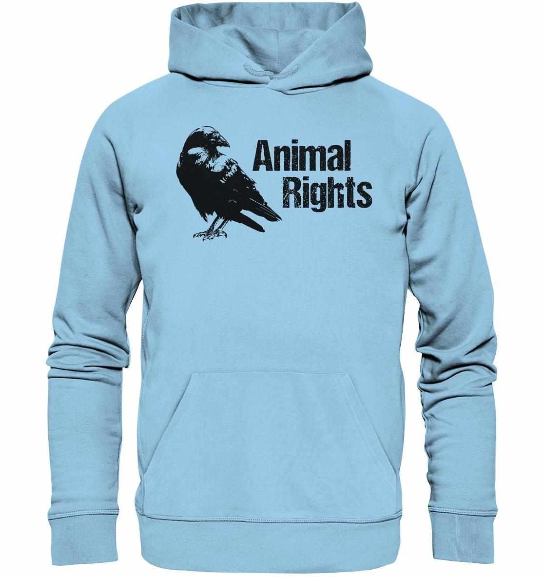 Vegan und Bio Hoodie: Raven - Animal Rights, hellblau mit schwarzem Vogelmotiv, aus Bio-Baumwolle und Recyclingmaterial, mit Kängurutasche und Kapuze.