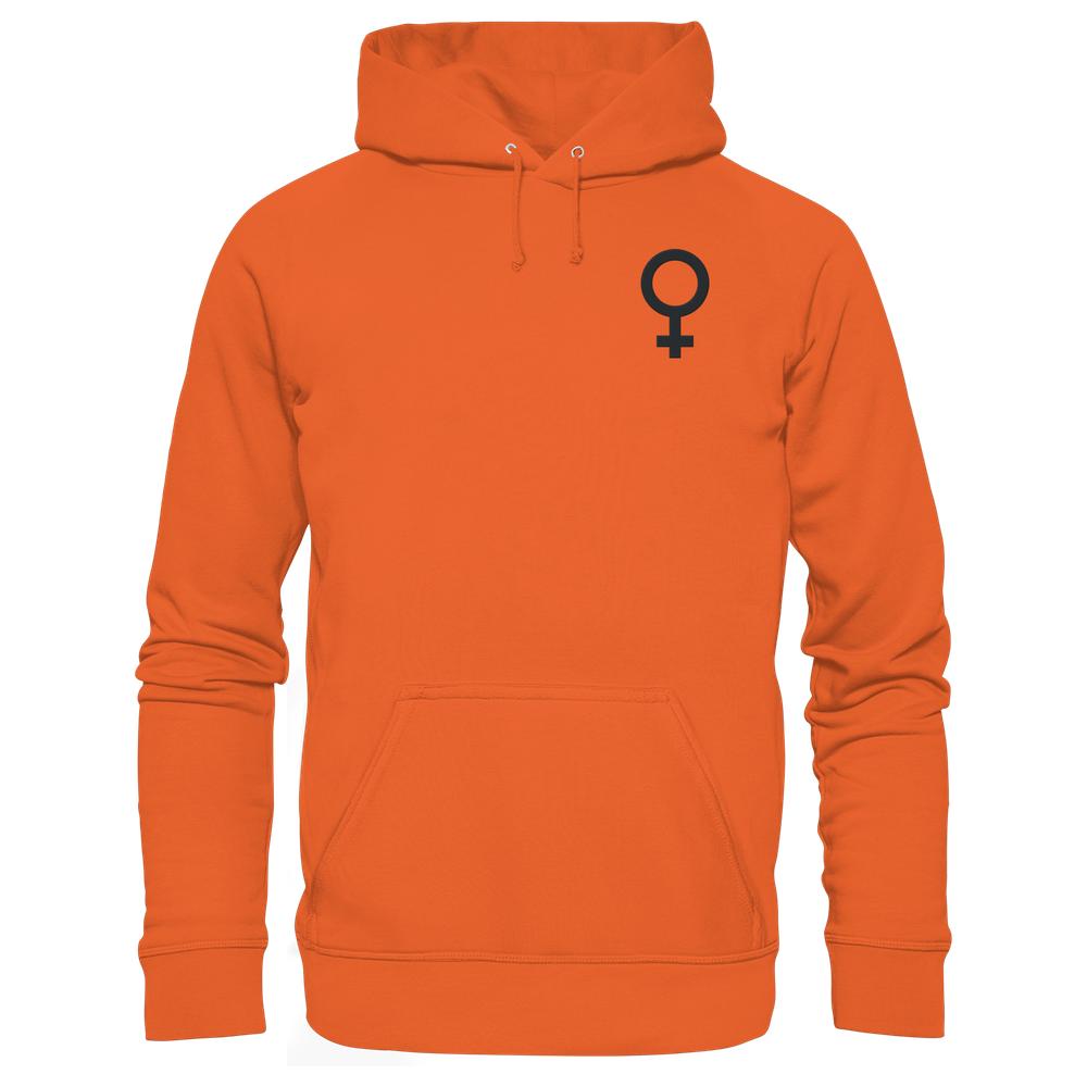 Vegan und Bio Hoodie bestickt: Das Venussymbol – orangefarbener Hoodie mit Kängurutasche, schwarzes Venussymbol auf der Brust, nachhaltige Baumwoll-Polyester-Mischung.