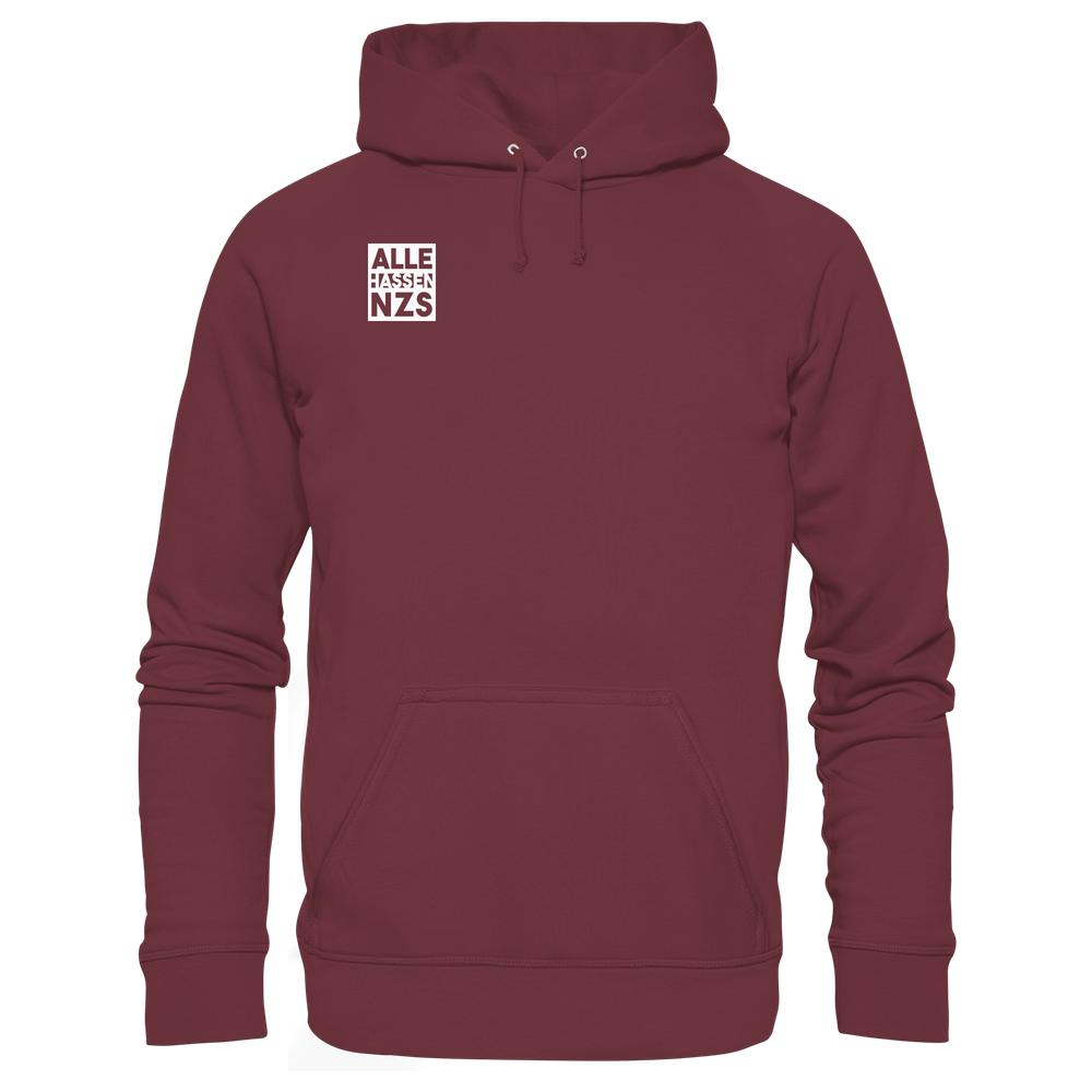 Vegan und Bio Hoodie: ALLE HASSEN NZS! mit weißem Print auf der Brust, Kängurutasche und Kapuze, aus nachhaltigen Materialien von RUDE REBEL.