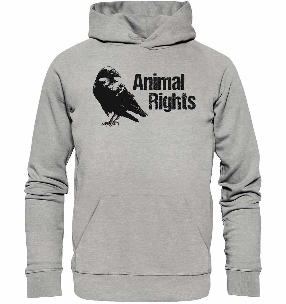 Vegan und Bio Hoodie: Raven - Animal Rights. Grauer Hoodie mit schwarzem Vogelmotiv, aus Bio-Baumwolle und recyceltem Polyester, symbolisiert Tierschutz und umweltfreundliches Design.