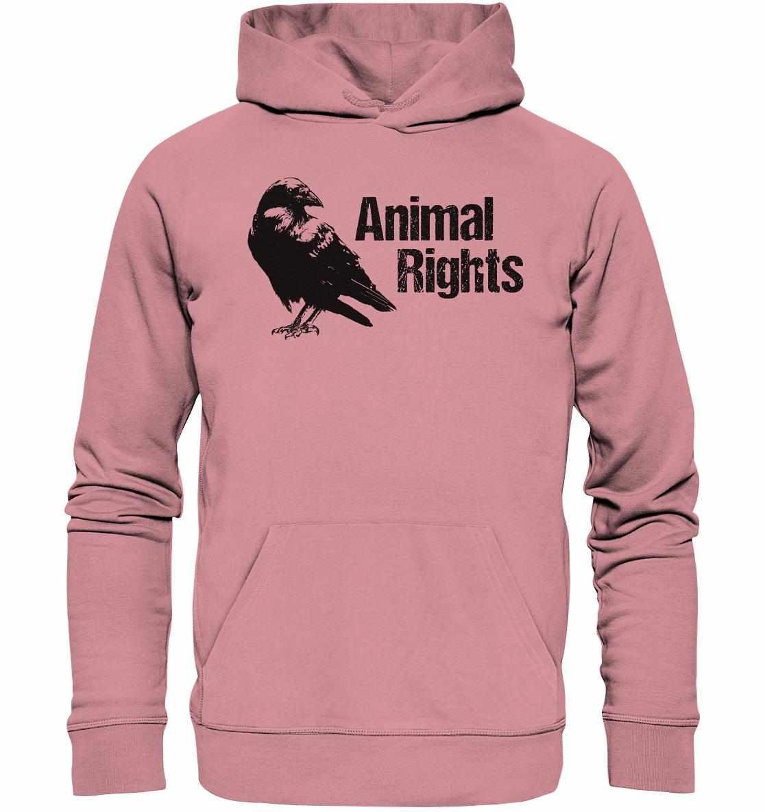 Vegan und Bio Hoodie: Raven - Animal Rights, rosa Kapuzenpullover mit schwarzem Vogelmotiv, aus nachhaltiger Bio-Baumwolle und recyceltem Polyester, ideal für Tier- und Umweltschutz.