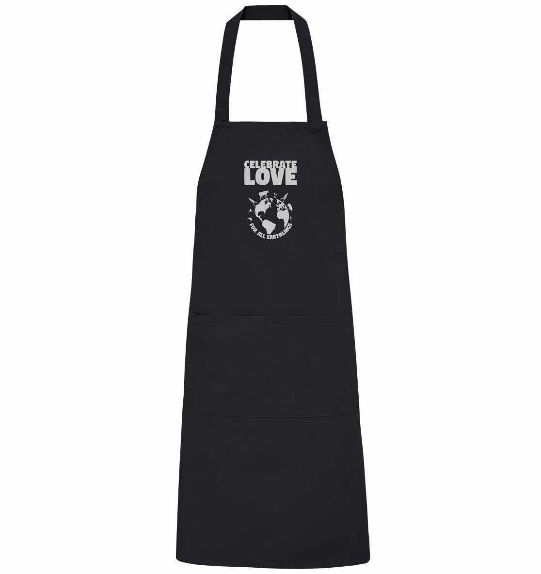 Schwarze Bio-Schürze mit weißem Text und Logo von Tieren um die Erde, repräsentiert Veganismus und Liebe zu allen Lebewesen.