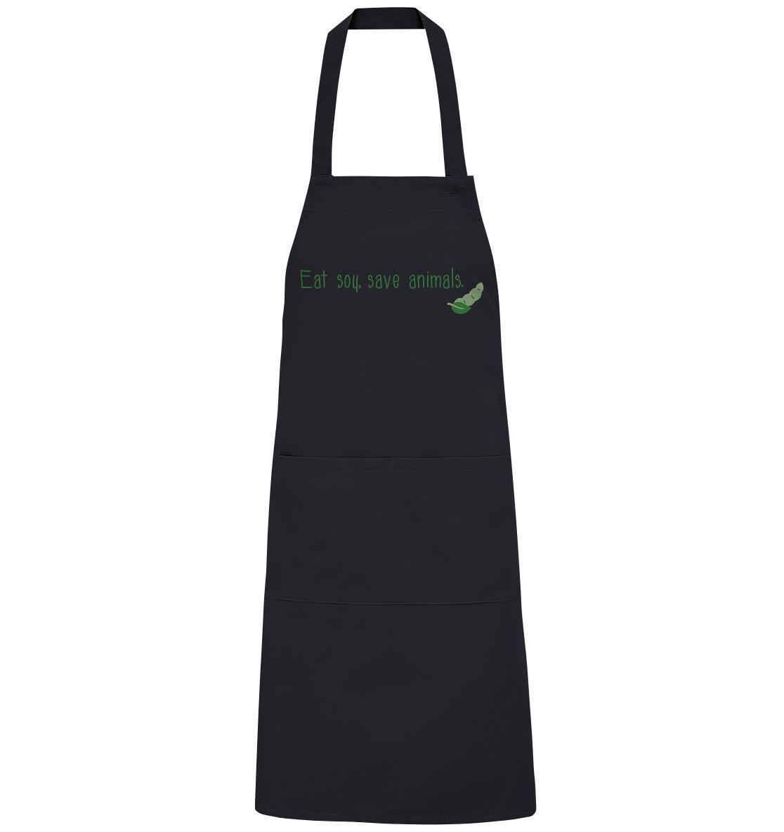 Vegan und Bio Schürze aus schwarzer Bio-Baumwolle mit grüner Aufschrift und verstellbarem Ausschnitt, symbolisiert tierfreundliches Grillen und nachhaltigen Lebensstil.