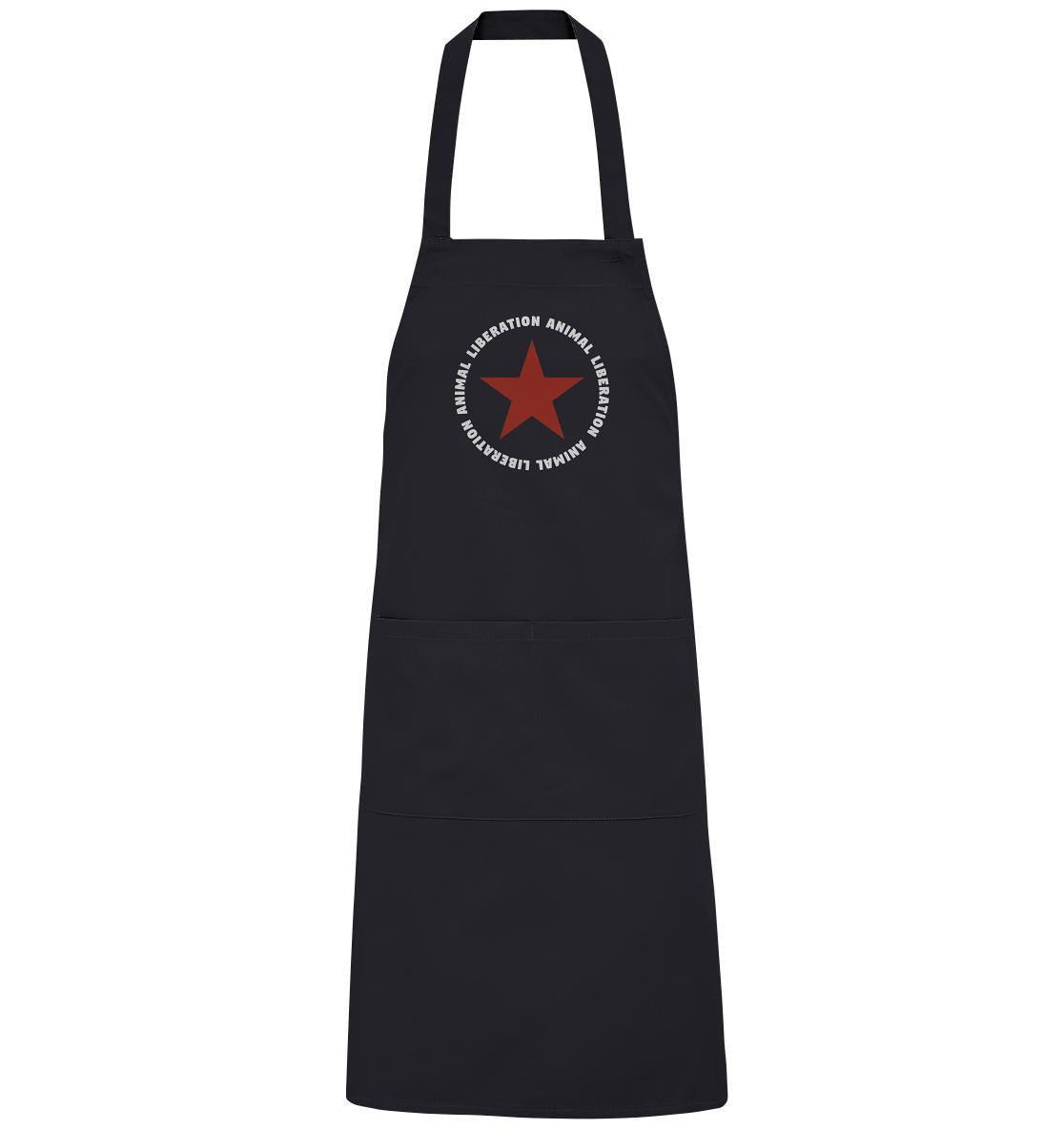 Schwarze Grillschürze aus Bio-Baumwolle mit rotem Stern und Botschaft der Tierrechtsbewegung, verstellbar und mit großen Vordertaschen. Modell: Vegan und Bio Schürze: Red Star and Animal Liberation.