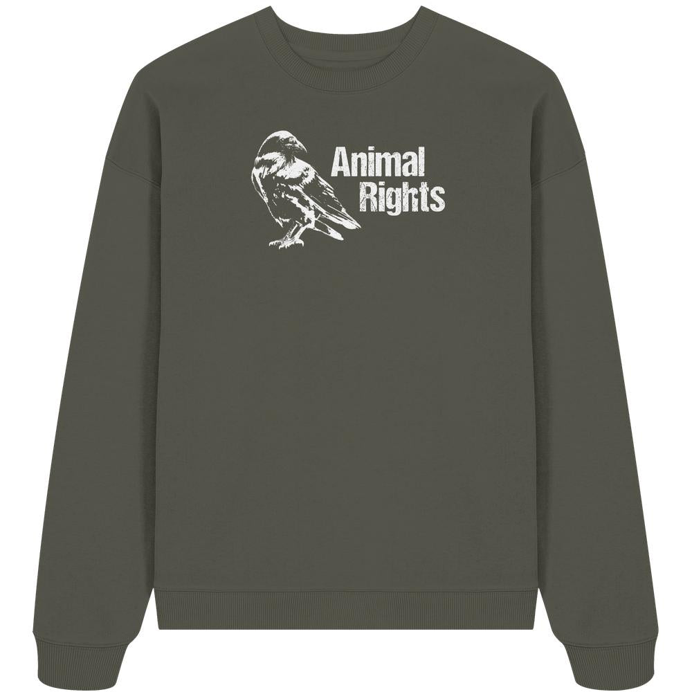 Vegan und Bio Oversized Sweatshirt: Raven - Animal Rights mit weißem Rabendruck und Animal Rights-Schriftzug. Hergestellt aus 100% Bio-Baumwolle, betont Tierrechte und nachhaltige Mode.