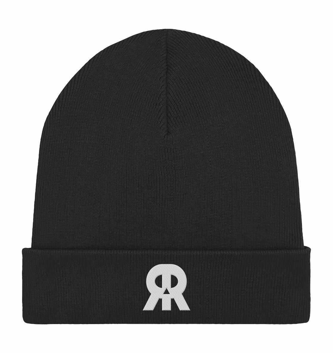 Schwarze Mütze mit weißem Rude Rebel-Logo in Form eines Schädels, aus Bio-Baumwolle und recyceltem Polyester, doppellagig und mit Umschlag.