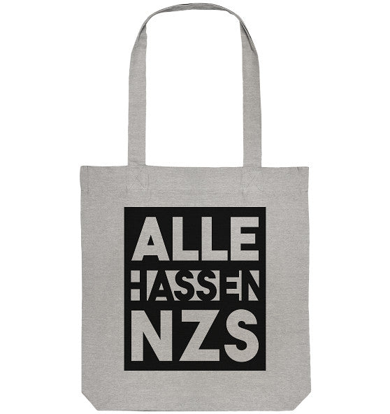 Leichtgraue Stofftasche mit langen Henkeln, zeigt den Slogan „ALLE HASSEN NZS“ in schwarzer Blockschrift. Hergestellt aus recycelter Baumwolle und Polyester.