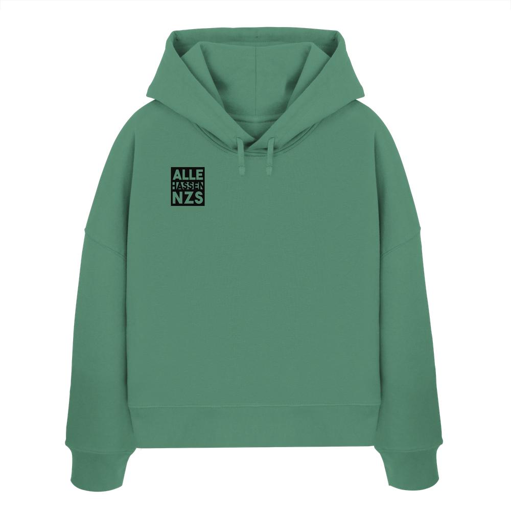 Vegan und Bio Crop Hoodie: ALLE HASSEN NZS! in lockerer Passform mit kleinem schwarzen Schriftzug auf der Brust, aus 100% Bio-Baumwolle.