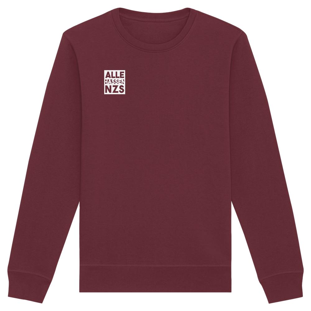 Vegan und Bio Unisex Sweatshirt: ALLE HASSEN NZS! mit kleinem weißen Print auf der Brust, normale Passform, aus Bio-Baumwolle und recyceltem Polyester.
