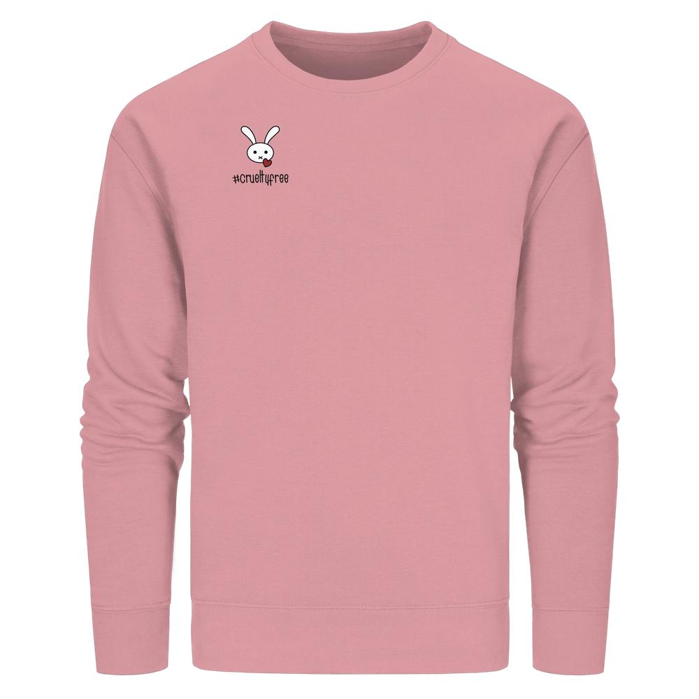 Vegan und Bio Unisex Sweatshirt: Crueltyfree Bunny – Pastellrosa Crewneck mit kleinem weißen Hasenmotiv und rotem Herz, gerippte Bündchen, nachhaltige Materialien.