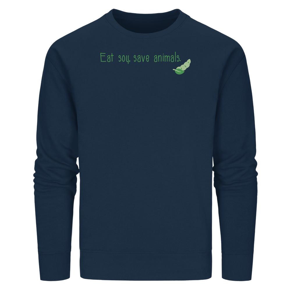 Unisex-Sweatshirt aus Bio-Baumwolle, navy, mit grünem Schriftzug „Eat soy, save animals“ und Sojabohnen-Illustration. Nachhaltig und vegan, passend zu RUDE REBELs rebellischem Stil.