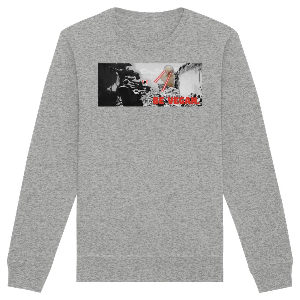 Vegan und Bio Sweatshirt: BE VEGAN. - Angry bird mit post-apokalyptischer Stadt, schwebender Fleischkugel, rotem Laser und veganer Botschaft; satirisches Design von RUDE REBEL.