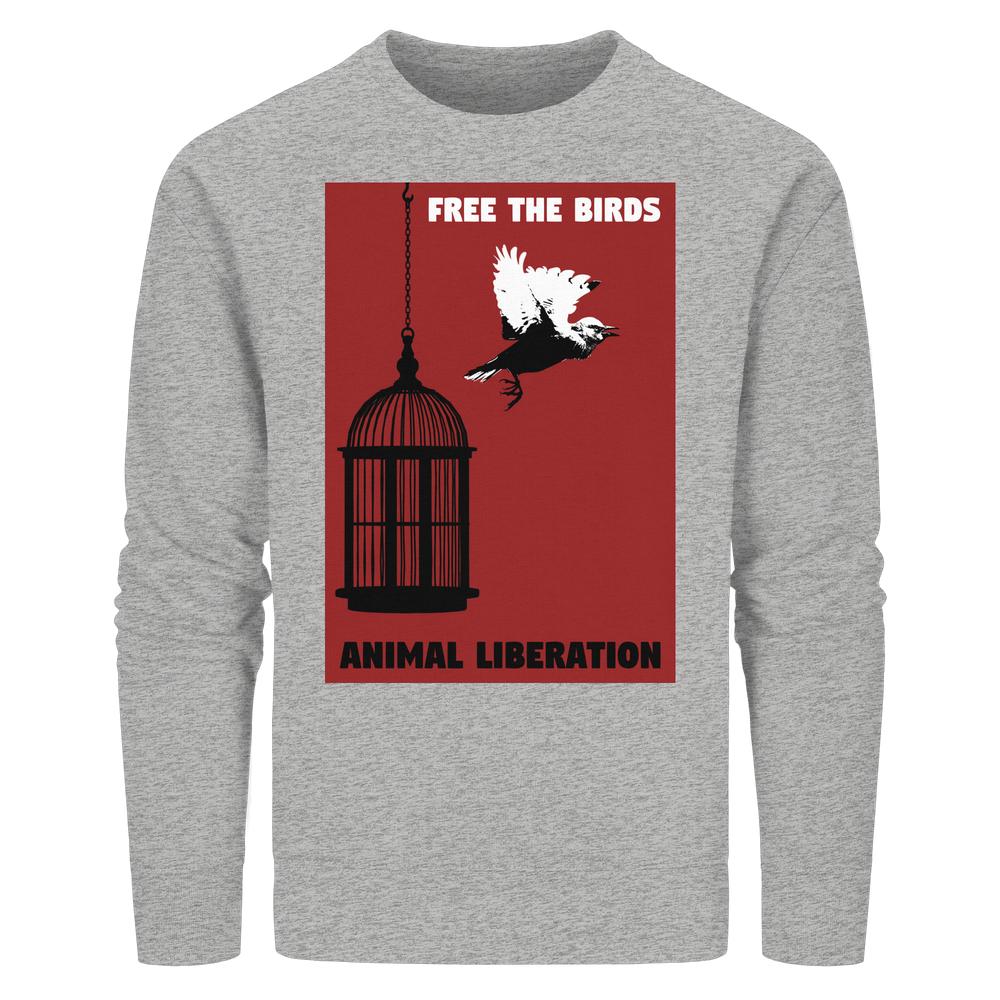 Vegan und Bio Unisex Sweatshirt: Free the birds - Animal Liberation mit Vogelkäfig- und freifliegendem Vogel-Motiv, betont Tierrechte und nachhaltige Mode.