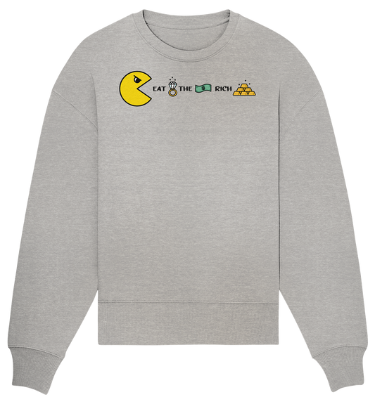 Vegan, Organic & Recycled Oversized Sweatshirt: PAC-MAN - Eat the rich (bedruckt mit PAC-MAN, der einen Diamantring, Geldschein und Goldbarren + Schriftzug isst, das Design befindet sich zwischen Hals und Brust) auf grau