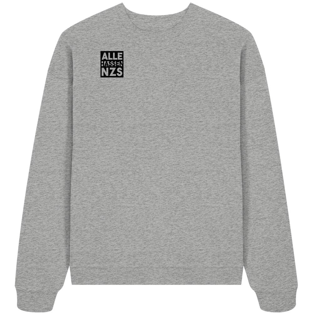 Oversized Sweatshirt aus Bio-Baumwolle mit ALLE HASSEN NZS!-Grafik auf der Brust. Nachhaltiges Design von RUDE REBEL, betont Antifaschismus und vegane Werte.