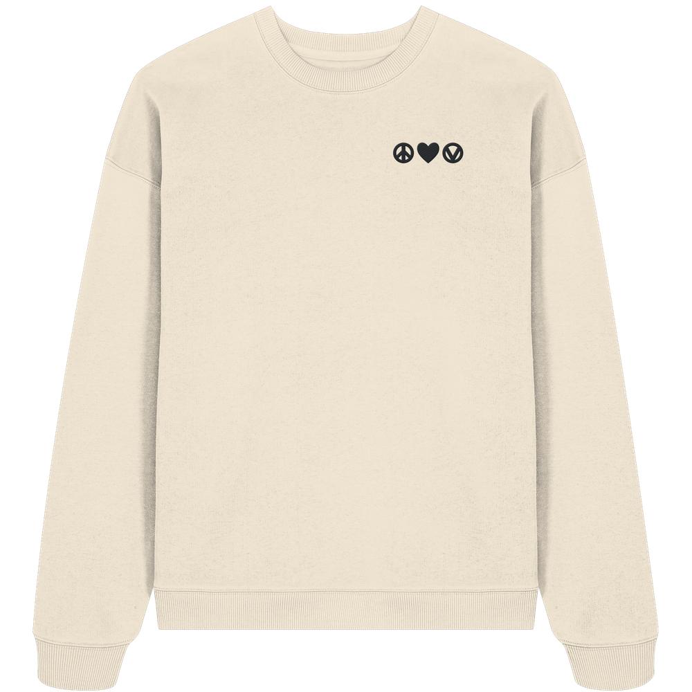 Vegan und Bio Oversized Sweatshirt bestickt: Peace - Love - Veganism, zeigt schwarze Symbole für Frieden, Liebe und Veganismus auf hellbeigem Stoff. Hergestellt aus 100% Bio-Baumwolle.