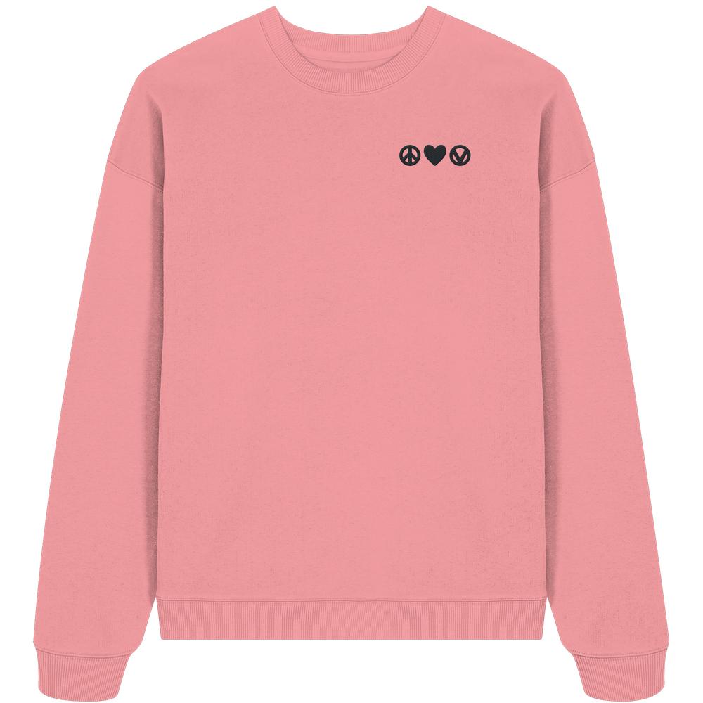 Vegan und Bio Oversized Sweatshirt bestickt: Peace - Love - Veganism. Rosa Crewneck mit schwarzen Icons: Friedenszeichen, Herz, stilisiertes V für Veganismus, aus 100% Bio-Baumwolle.
