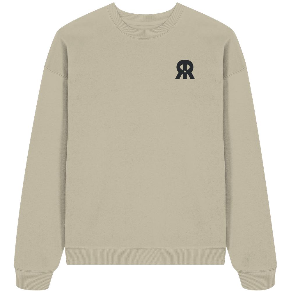 Vegan und Bio Oversized Sweatshirt bestickt: RUDE REBEL Skull, beige, mit kleinem schwarzen Logo auf der Brust. Hergestellt aus 100% Bio-Baumwolle, oversized Schnitt.