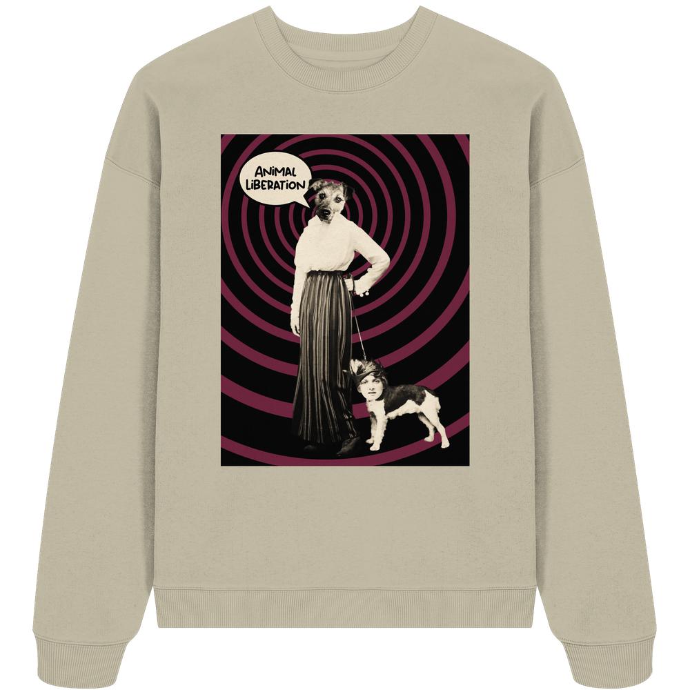 Vegan und Bio Oversized Sweatshirt: Upside Down - Animal Liberation, beige, mit surrealem Retro-Collage-Design: Hundekopf-Person mit Frauenkopf-Hund, spiralem Hintergrund und ANIMAL LIBERATION Sprechblase.