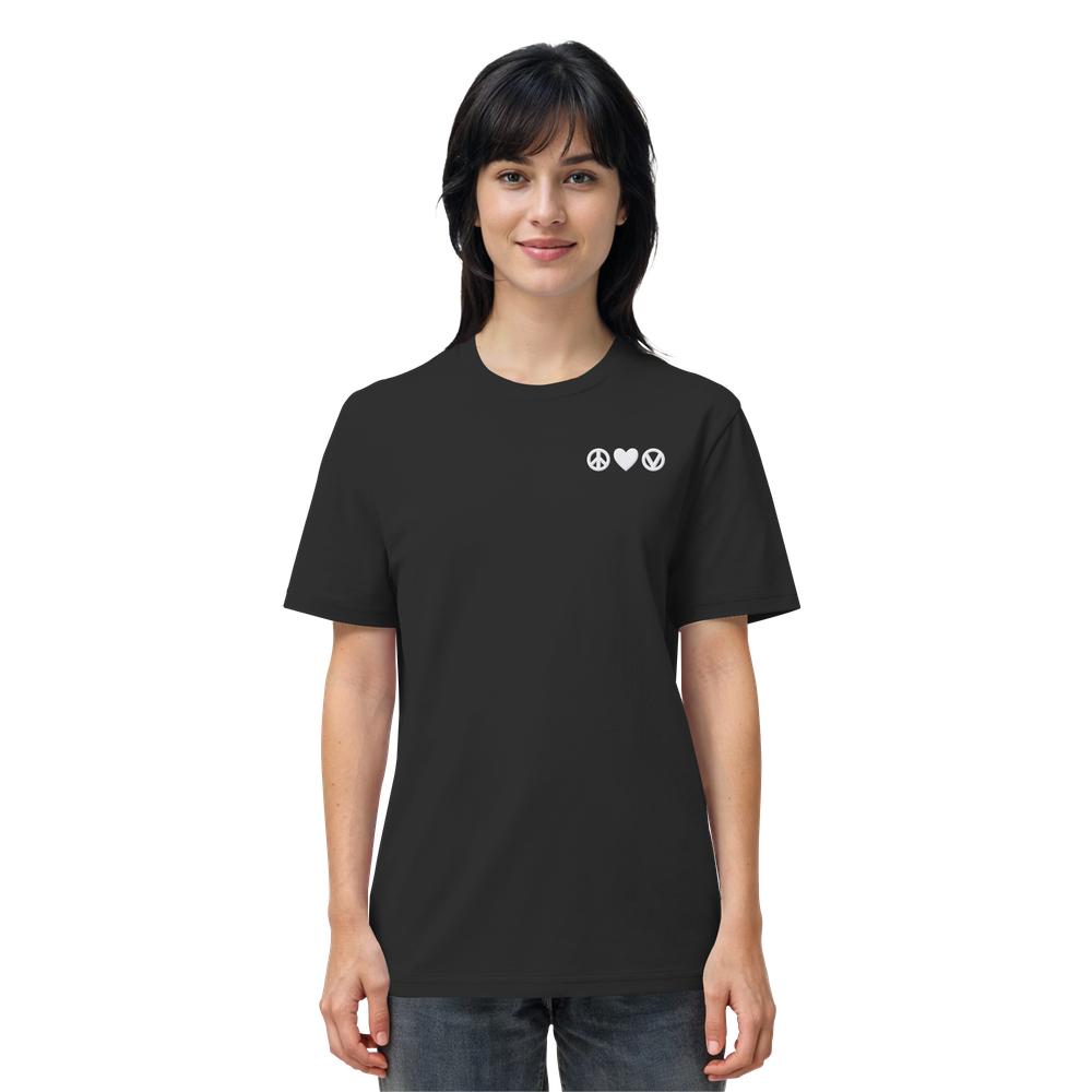 Junge Frau im schwarzen T-Shirt mit gestickten Symbolen: Peace, Herz, vegan. Vegan und Bio Unisex Shirt bestickt: Peace - Love - Veganism aus 100% Bio-Baumwolle.