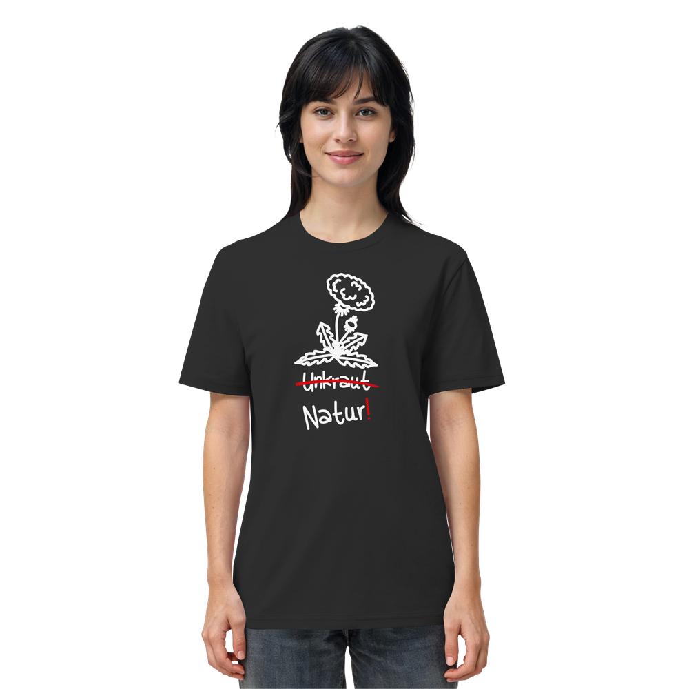 Person trägt ein schwarzes T-Shirt mit weißem Löwenzahn-Motiv, rotem durchgestrichenem Unkraut und Natur! in weiß. Produkt: Vegan und Bio Unisex Shirt: Löwenzahn.