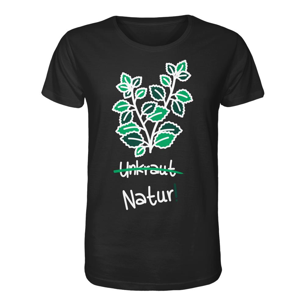 Frauen-T-Shirt in Schwarz mit grün-weißer Pflanzengrafik und Text Unkraut (durchgestrichen) und Natur! in Weiß. Bio-Baumwolle, rebellisches veganes Design von RUDE REBEL.