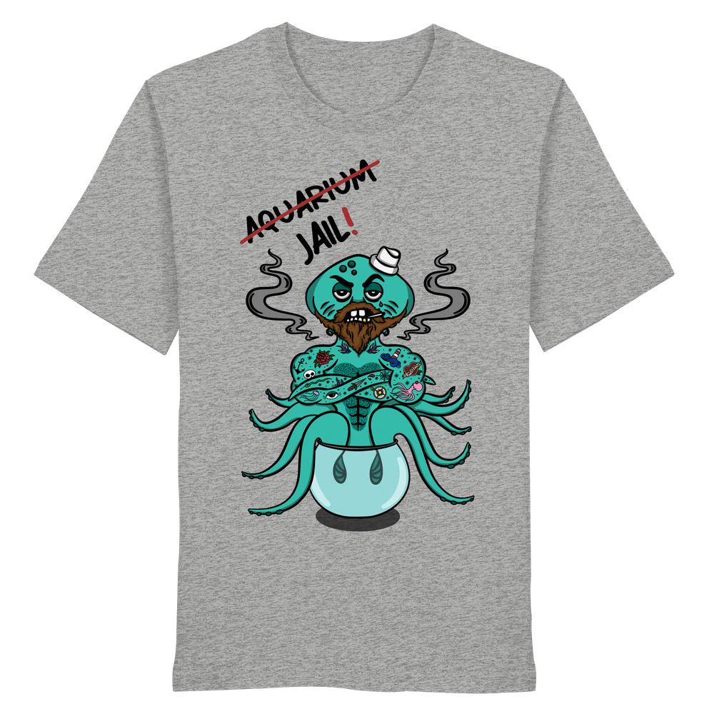 Graues T-Shirt mit Cartoon-Oktopus im Fischglas, der „AQUARIUM“ durchgestrichen und durch „JAIL!“ ersetzt. Design thematisiert Tierrechte. Bio-Baumwolle, unisex.