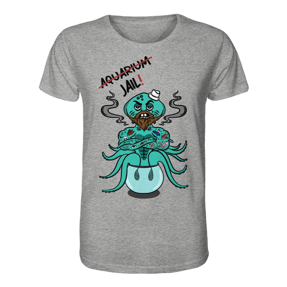Vegan und Bio Unisex Shirt: Animal Rights - Aquarium=Jail!, zeigt einen tätowierten, bärtigen Tintenfisch als Seemann, im Fischglas Gefängnis, mit Rauch und Seemannsmütze.