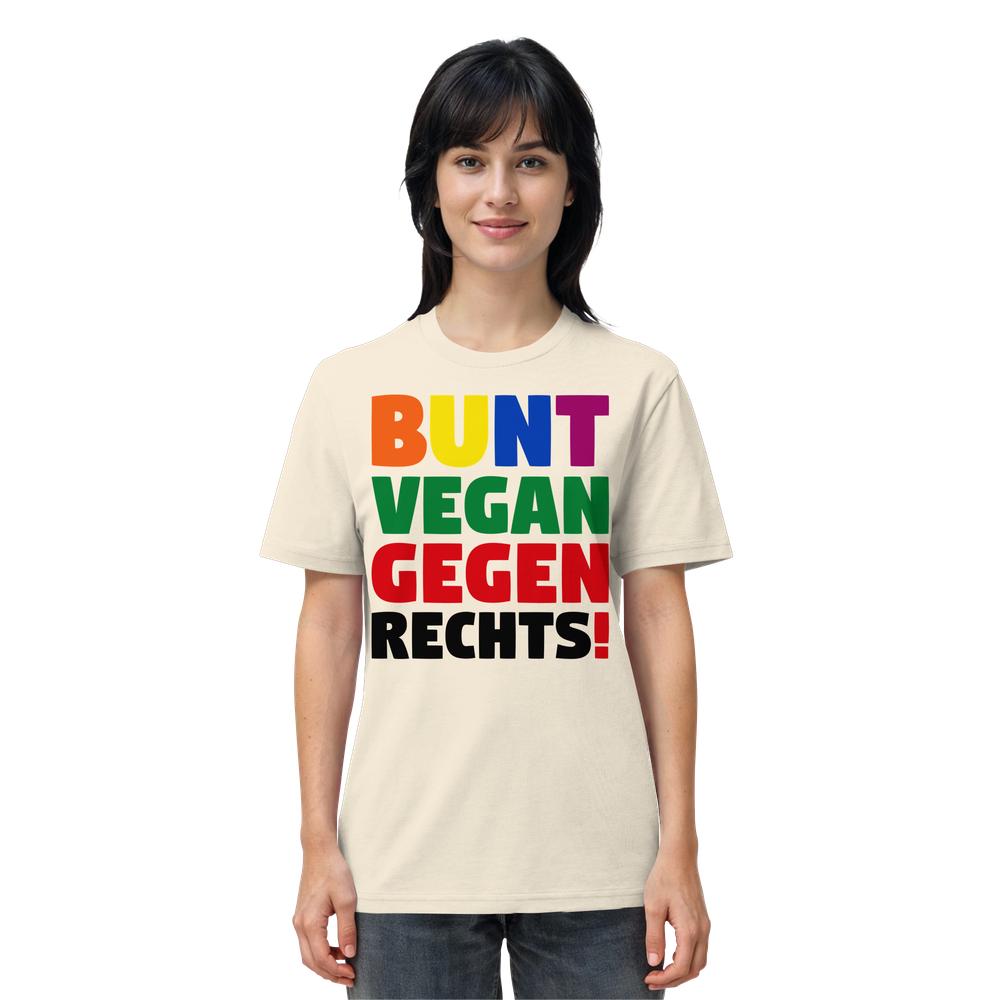 Person trägt ein helles T-Shirt mit dem Aufdruck BUNT, VEGAN, GEGEN RECHTS!, das für Toleranz, Veganismus und gegen rechte Politik steht, aus Bio-Baumwolle von RUDE REBEL.
