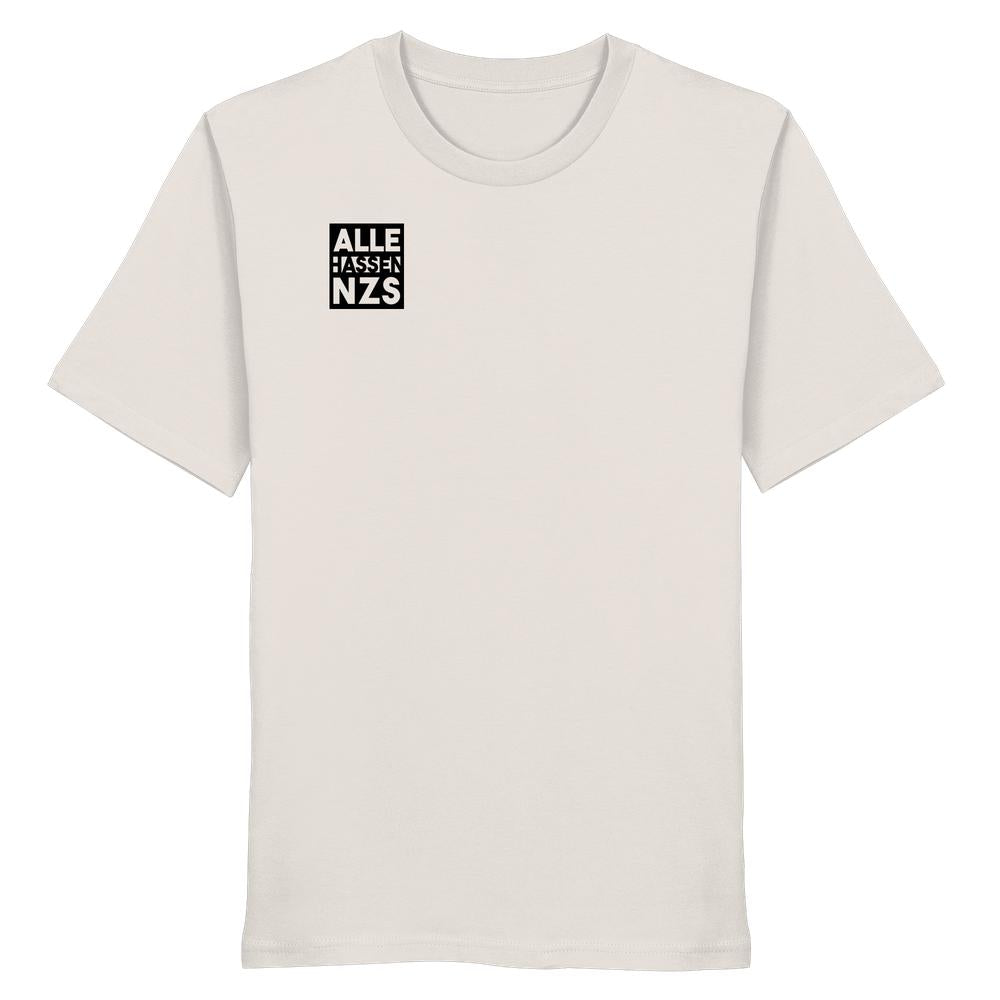 Vegan und Bio Unisex Shirt: ALLE HASSEN NZS!, schlichtes cremefarbenes Design mit schwarzem Quadrat und weißem Text auf der Brust. 100% Bio-Baumwolle, normale Passform.