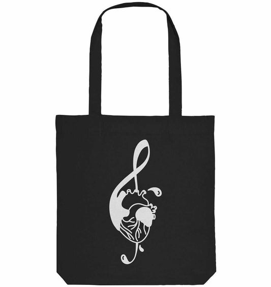 Vegan und Recycling Stofftasche: Music Therapy with Heart, zeigt ein schwarzes Design mit weißem Herz und Notenschlüssel, betont musikalische Leidenschaft und nachhaltige Materialien.